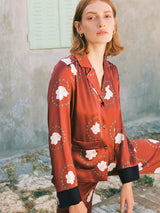 Ronna Nice Iman silk shirt in red blanch print black cuffs two front pockets sista pants red silk suit