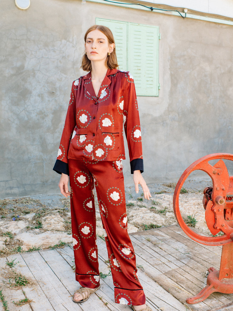 Ronna Nice Iman silk shirt in red blanch print black cuffs two front pockets sista pants red silk suit 